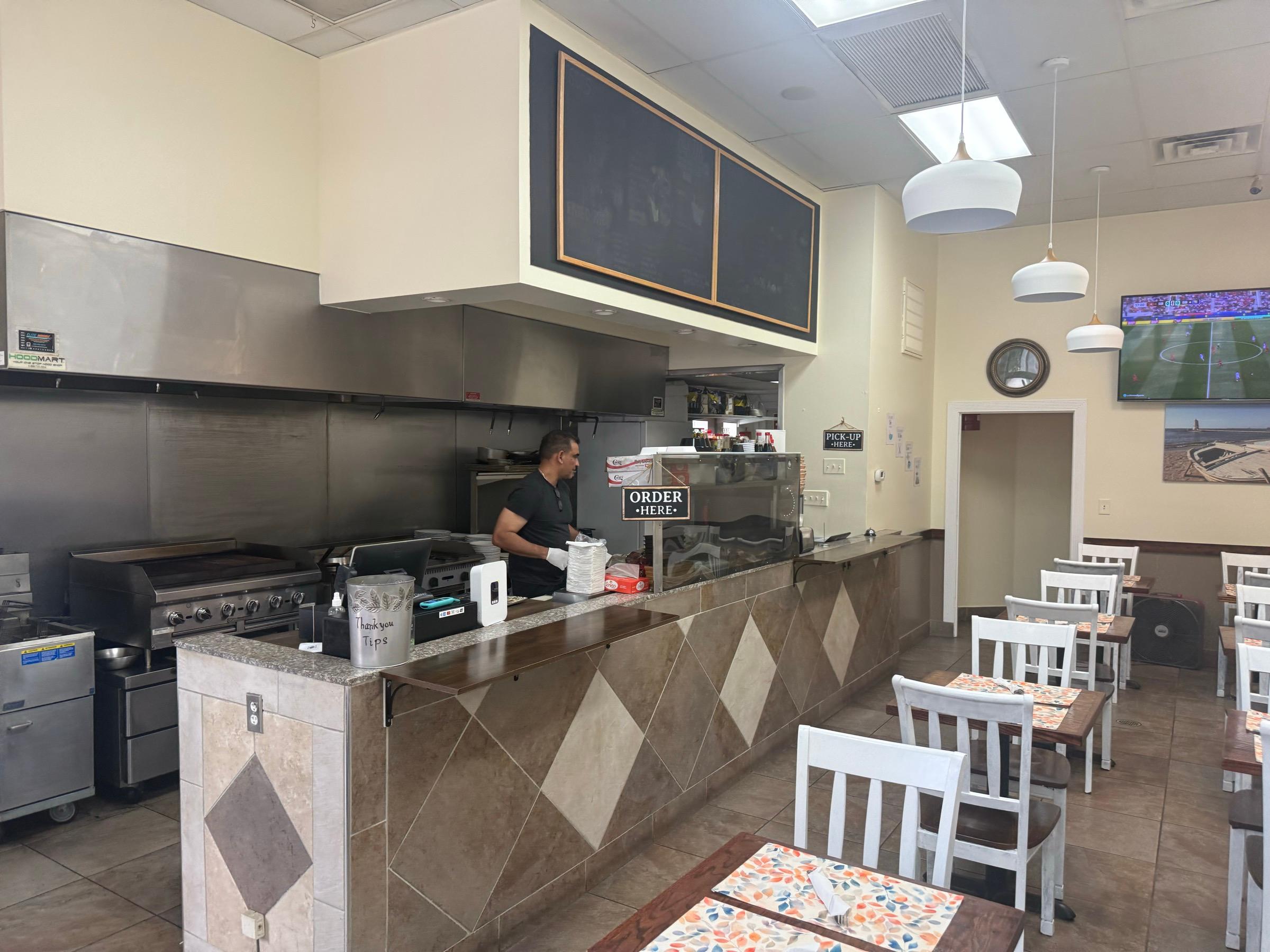 Chalkboard menus above the counter